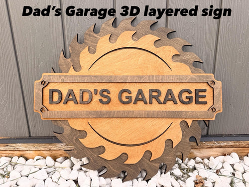 Dad’s Garage layered wooden saw-blade sign without hooks
